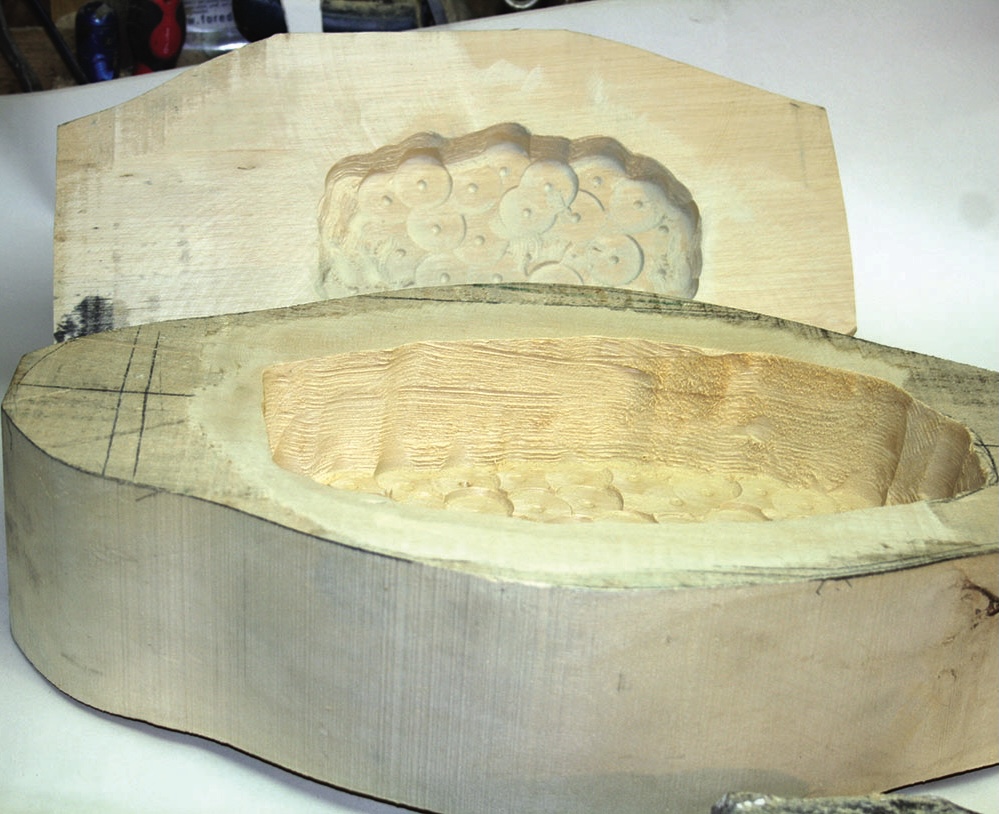 Wooden butter mould with intricate carvings