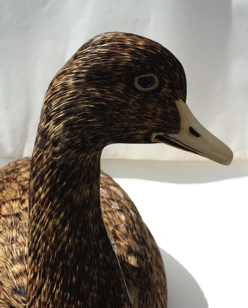 Duck-shaped wicker basket with detailed weaving