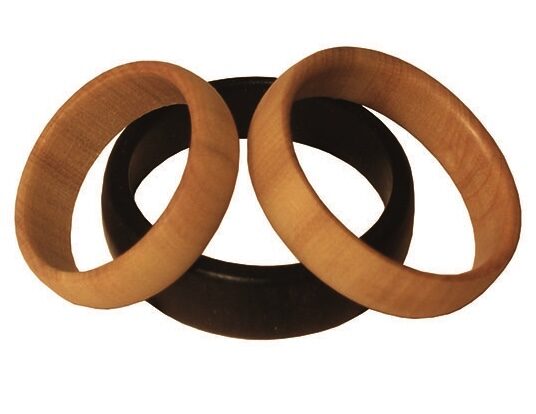 Three wooden bracelets stacked together.