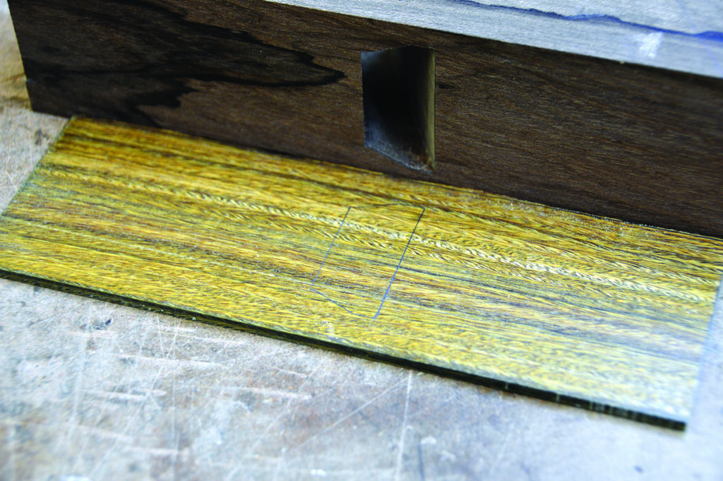 Wood joint with mortise and tenon detail.