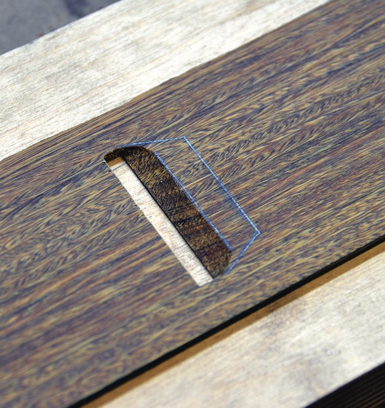 Crafted wooden joint in close detail view.