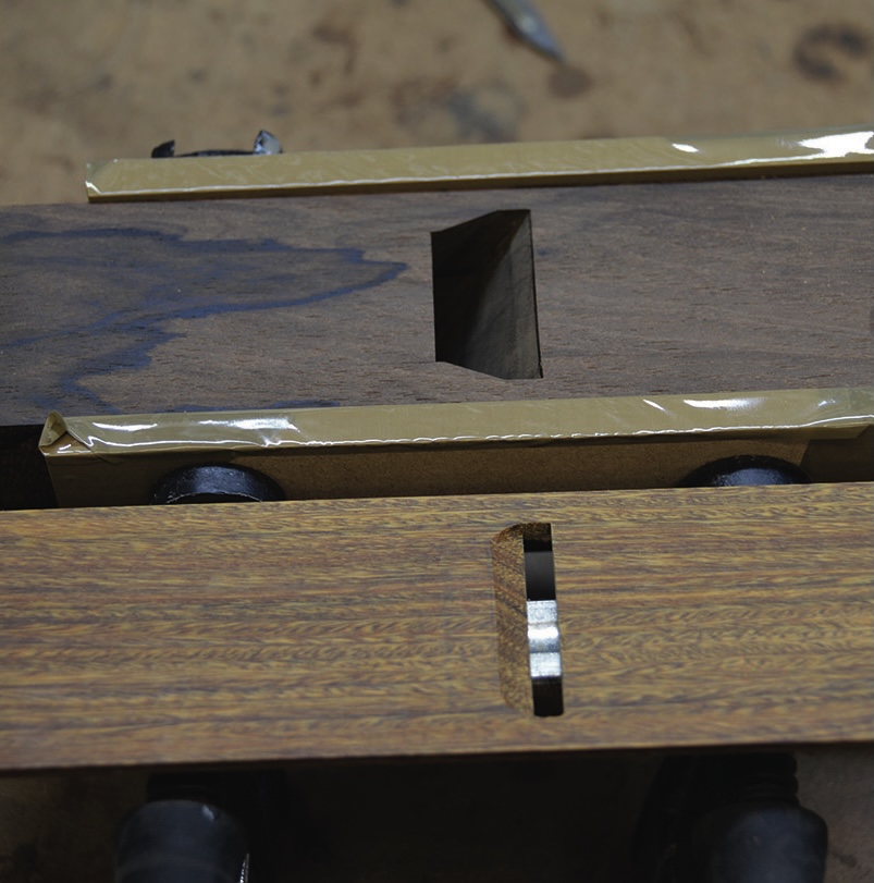 Woodworking tools on a workbench.