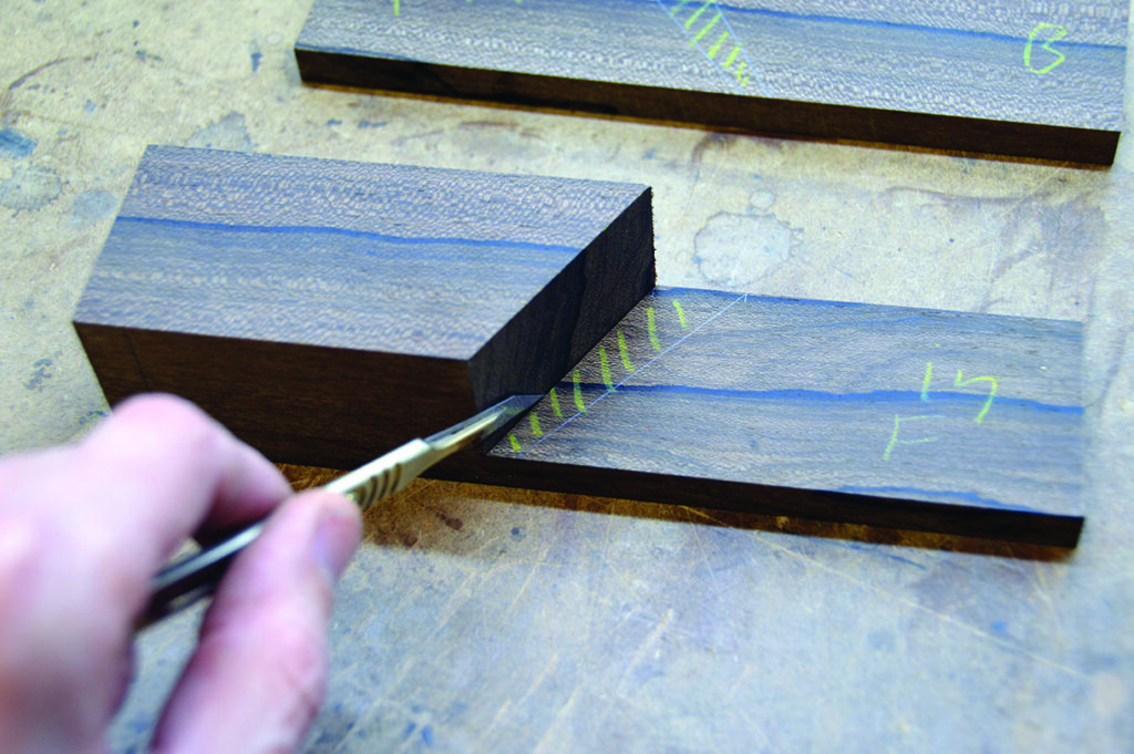 Person measuring wood for precise cutting