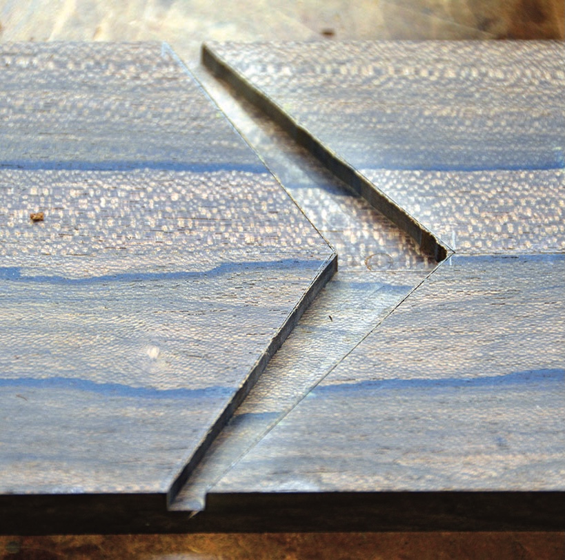 Close-up of a unique wooden joint pattern.