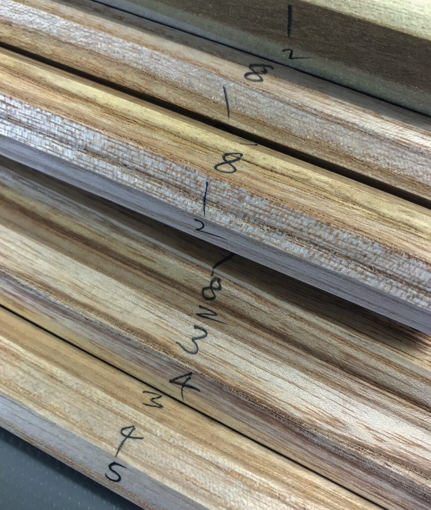 Stacked wood pieces with measured markings