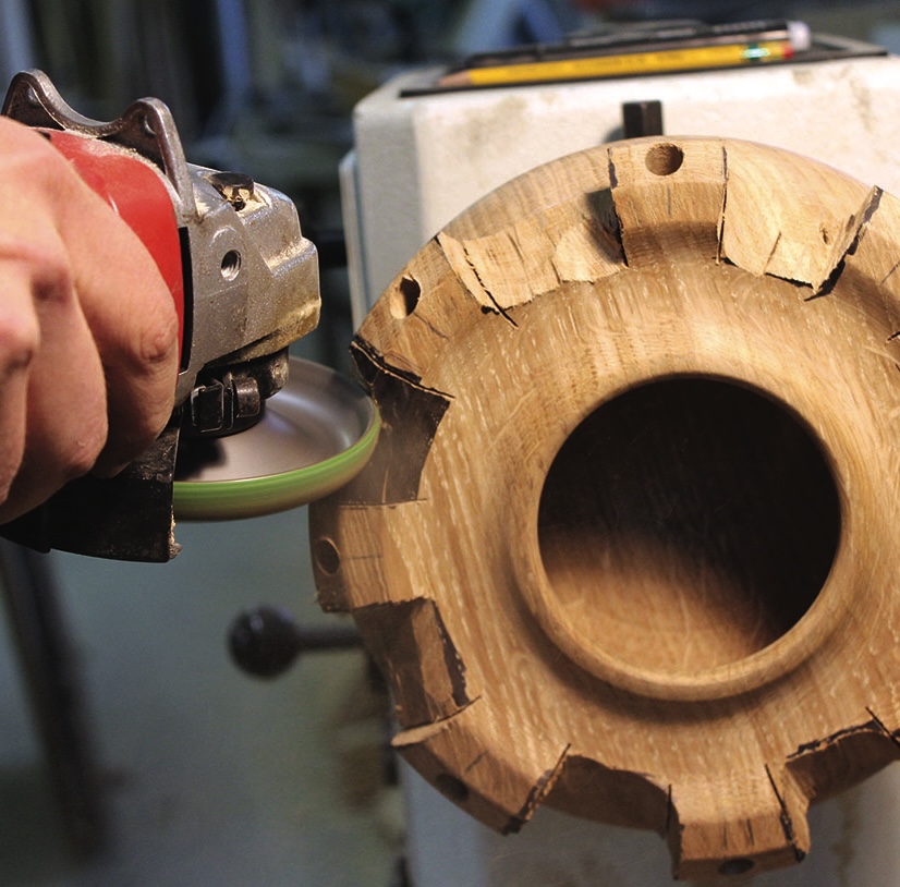 Woodturning with hand tool on lathe