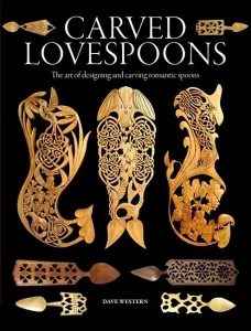 Intricately carved lovespoons on book cover.