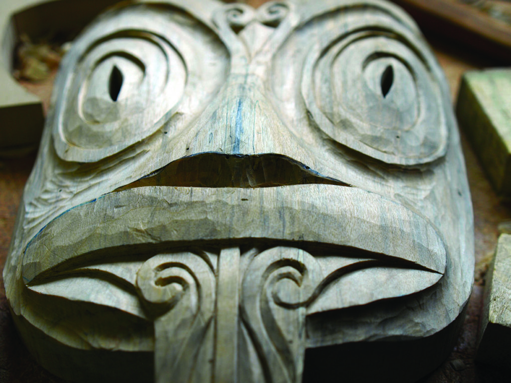 Close-up of a carved wooden ceremonial mask