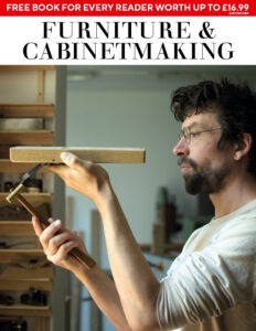 Person crafting furniture with hammer and wood