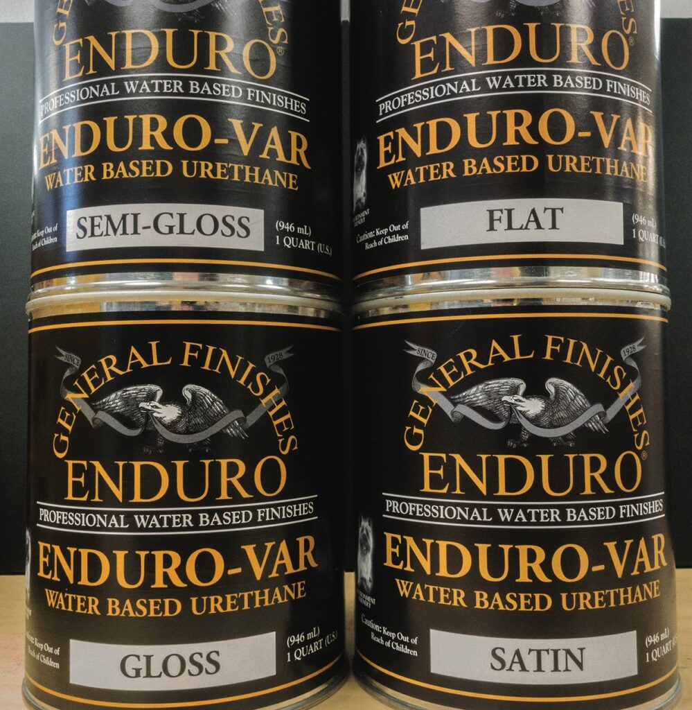Four cans of General Finishes Enduro-Var varnish.