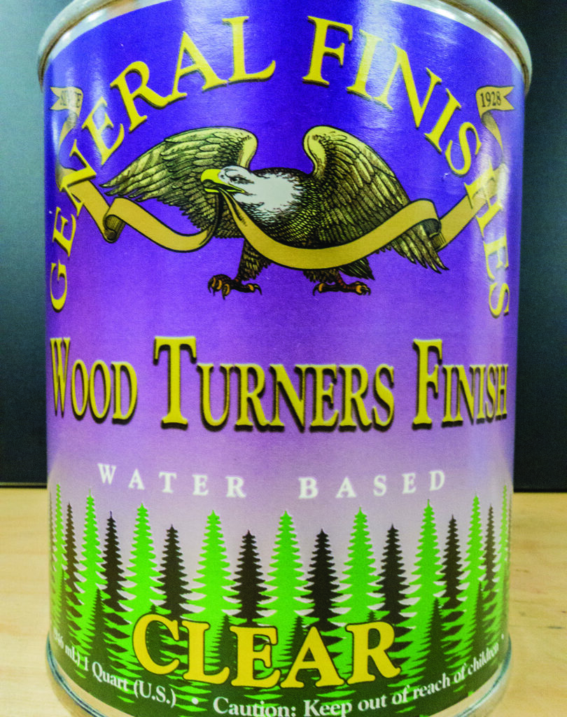 General Finishes wood finish tin with eagle emblem.