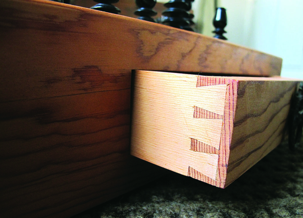 Close-up of handcrafted wooden drawer dovetail joints