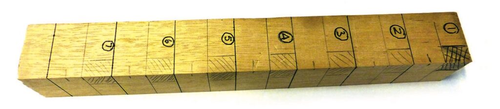 Numbered wooden block puzzle or brainteaser.
