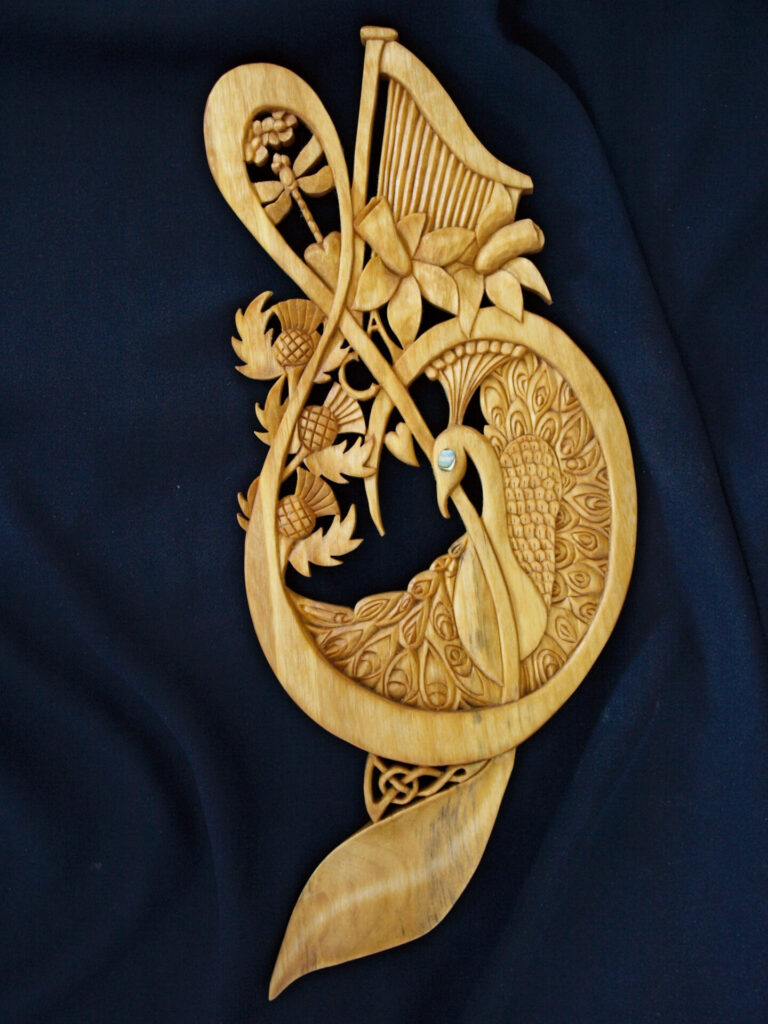 Intricate wooden carving with floral patterns