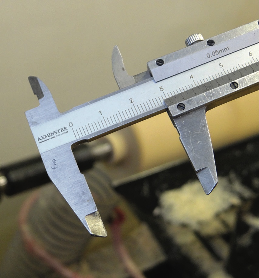Close-up of a metal vernier calliper scale